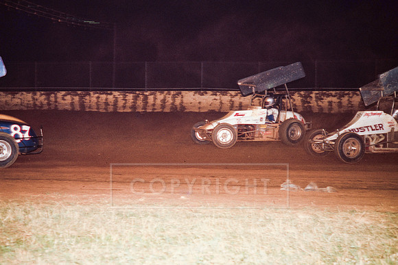 #87 Larry Krimes, #11 Steve Kinser and #70 Doug Stambaugh at Penn National-6